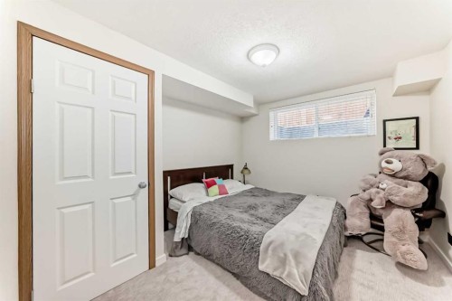51 Everstone Boulevard Sw, Calgary, AB - Indoor Photo Showing Bedroom