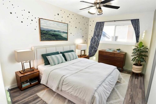 112 Woodvale Road Sw, Calgary, AB - Indoor Photo Showing Bedroom