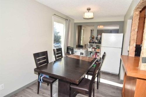 112 Woodvale Road Sw, Calgary, AB - Indoor Photo Showing Dining Room