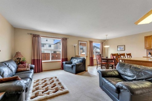 214 Saddlemont Boulevard Ne, Calgary, AB - Indoor Photo Showing Living Room