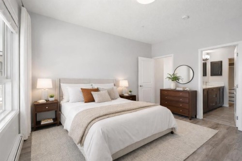 302-200 Harvest Hills Place Ne, Calgary, AB - Indoor Photo Showing Bedroom