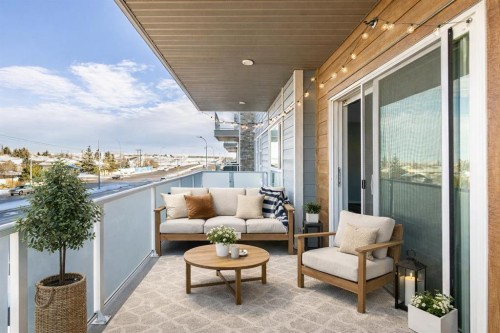 302-200 Harvest Hills Place Ne, Calgary, AB - Outdoor With Balcony With Exterior