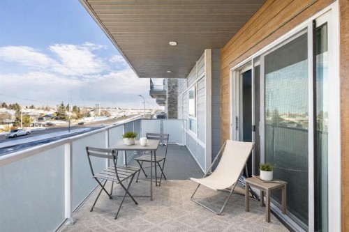302-200 Harvest Hills Place Ne, Calgary, AB - Outdoor With Balcony With Exterior