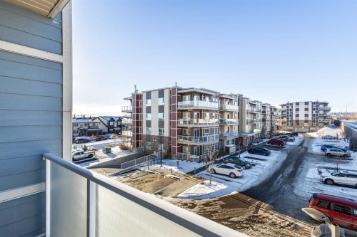 302-200 Harvest Hills Place Ne, Calgary, AB - Outdoor With Balcony