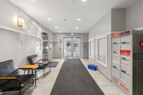 302-200 Harvest Hills Place Ne, Calgary, AB - Indoor Photo Showing Other Room