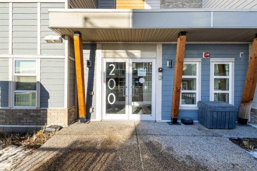302-200 Harvest Hills Place Ne, Calgary, AB - Outdoor With Exterior