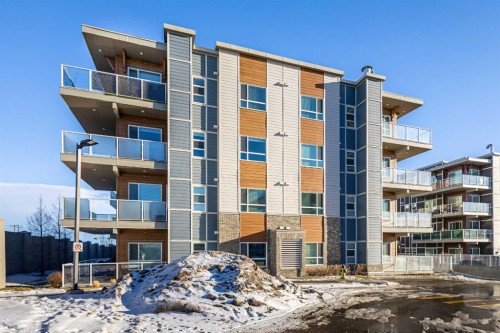 302-200 Harvest Hills Place Ne, Calgary, AB - Outdoor With Balcony