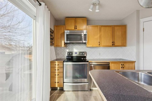 31 Prestwick Grove Se, Calgary, AB - Indoor Photo Showing Kitchen With Stainless Steel Kitchen