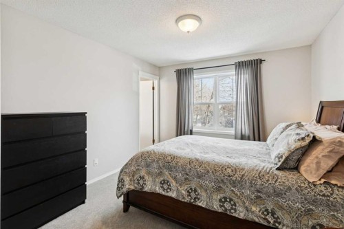 31 Prestwick Grove Se, Calgary, AB - Indoor Photo Showing Bedroom
