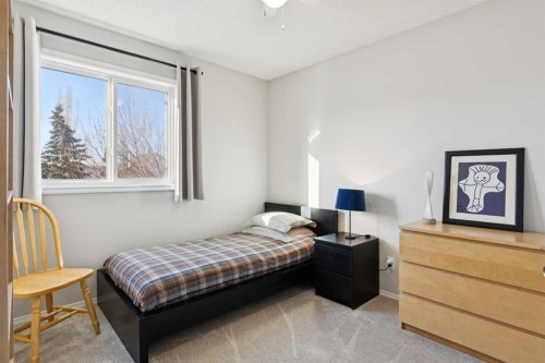 31 Prestwick Grove Se, Calgary, AB - Indoor Photo Showing Bedroom