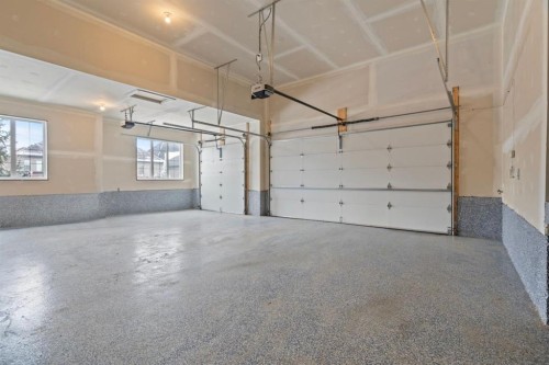 137 Waters Edge Drive, Heritage Pointe, AB - Indoor Photo Showing Garage