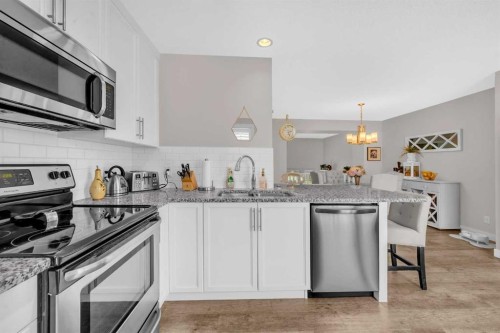 45 Auburn Meadows Way Se, Calgary, AB - Indoor Photo Showing Kitchen With Stainless Steel Kitchen With Double Sink With Upgraded Kitchen
