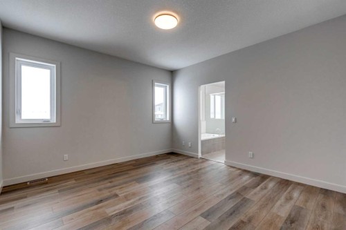 554 Rivercrest View, Cochrane, AB - Indoor Photo Showing Other Room