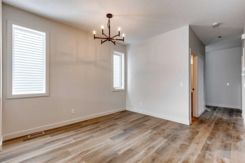 554 Rivercrest View, Cochrane, AB - Indoor Photo Showing Other Room