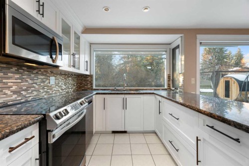 1447 Acadia Drive Se, Calgary, AB - Indoor Photo Showing Kitchen With Upgraded Kitchen