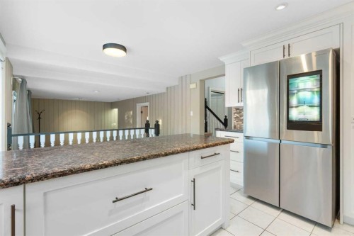 1447 Acadia Drive Se, Calgary, AB - Indoor Photo Showing Kitchen