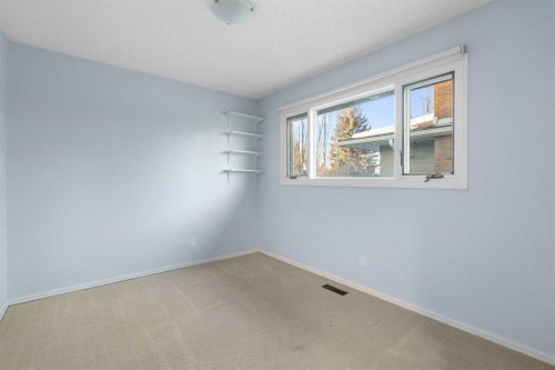 1447 Acadia Drive Se, Calgary, AB - Indoor Photo Showing Other Room