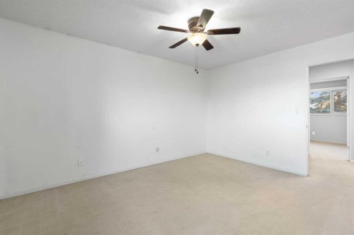 1447 Acadia Drive Se, Calgary, AB - Indoor Photo Showing Other Room