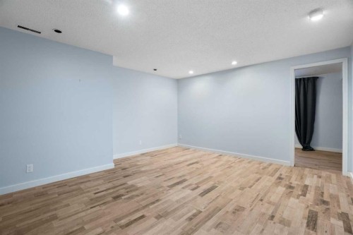 1447 Acadia Drive Se, Calgary, AB - Indoor Photo Showing Other Room