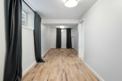 1447 Acadia Drive Se, Calgary, AB - Indoor Photo Showing Other Room