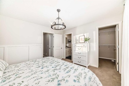112 Sunvalley Road, Cochrane, AB - Indoor Photo Showing Bedroom