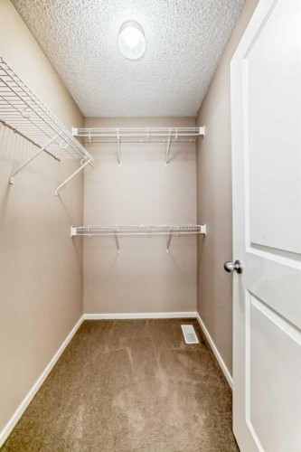 112 Sunvalley Road, Cochrane, AB - Indoor With Storage