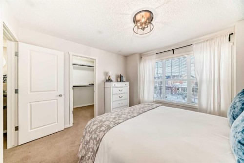 112 Sunvalley Road, Cochrane, AB - Indoor Photo Showing Bedroom