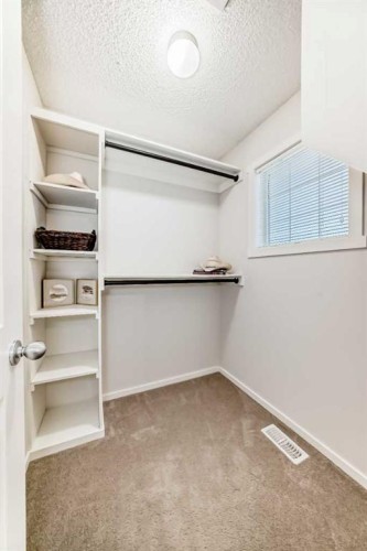 112 Sunvalley Road, Cochrane, AB - Indoor With Storage