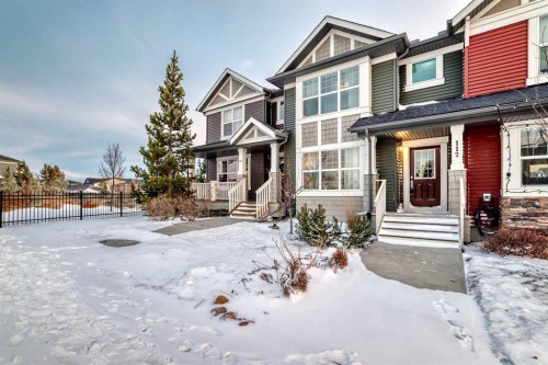 112 Sunvalley Road, Cochrane, AB - Outdoor With Facade