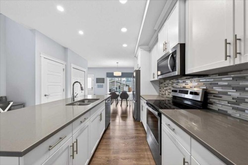 117 Evanston Hill Nw, Calgary, AB - Indoor Photo Showing Kitchen With Double Sink With Upgraded Kitchen