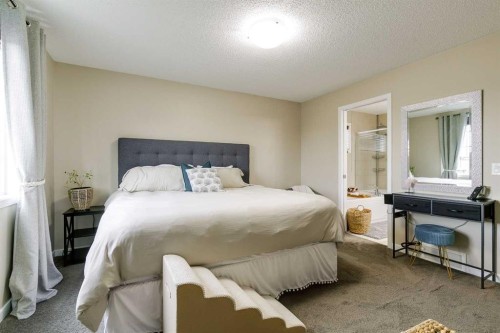 114 Cranford Bay Se, Calgary, AB - Indoor Photo Showing Bedroom