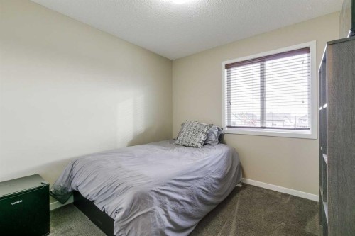 114 Cranford Bay Se, Calgary, AB - Indoor Photo Showing Bedroom