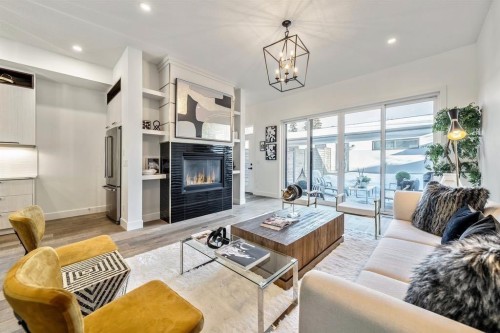 3316 41 Street Sw, Calgary, AB - Indoor Photo Showing Living Room With Fireplace