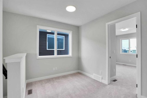 144 Cobblestone Gate Sw, Airdrie, AB - Indoor Photo Showing Other Room