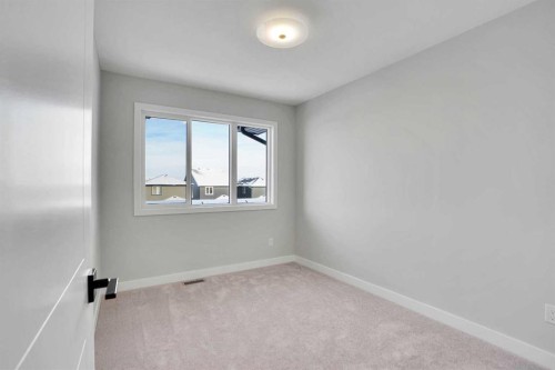 144 Cobblestone Gate Sw, Airdrie, AB - Indoor Photo Showing Other Room