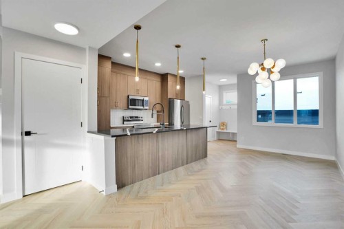 144 Cobblestone Gate Sw, Airdrie, AB - Indoor Photo Showing Kitchen With Upgraded Kitchen