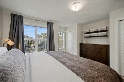 352 Cranbrook Square Se, Calgary, AB - Indoor Photo Showing Bedroom