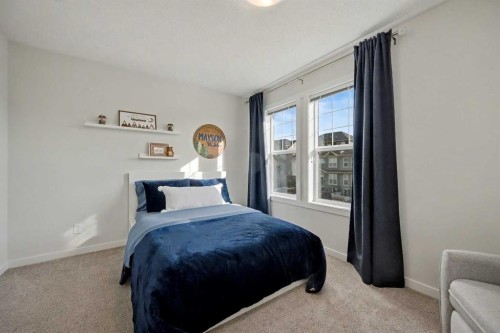 352 Cranbrook Square Se, Calgary, AB - Indoor Photo Showing Bedroom