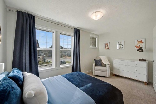 352 Cranbrook Square Se, Calgary, AB - Indoor Photo Showing Bedroom
