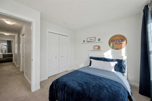 352 Cranbrook Square Se, Calgary, AB - Indoor Photo Showing Bedroom