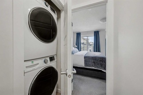 352 Cranbrook Square Se, Calgary, AB - Indoor Photo Showing Laundry Room