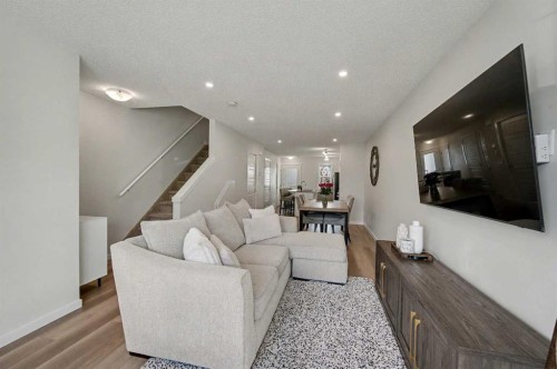 352 Cranbrook Square Se, Calgary, AB - Indoor Photo Showing Living Room