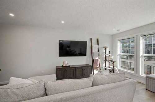 352 Cranbrook Square Se, Calgary, AB - Indoor Photo Showing Living Room