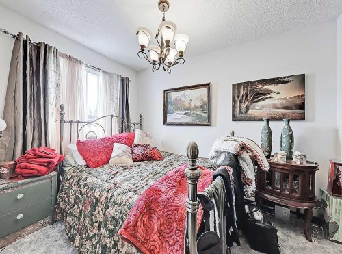 32 Sheppard Road Sw, High River, AB - Indoor Photo Showing Bedroom