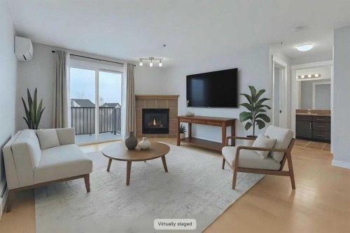 4313-31 Country Village Manor Ne, Calgary, AB - Indoor Photo Showing Living Room With Fireplace