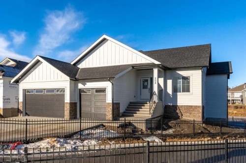 208 Monterey Bay Se, High River, AB - Outdoor With Facade