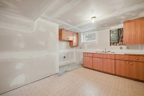 200 Van Horne Crescent Ne, Calgary, AB - Indoor Photo Showing Kitchen With Double Sink