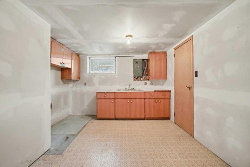 200 Van Horne Crescent Ne, Calgary, AB - Indoor Photo Showing Kitchen With Double Sink