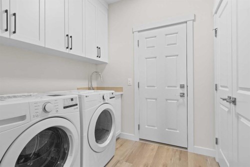 210 Monterey, High River, AB - Indoor Photo Showing Laundry Room