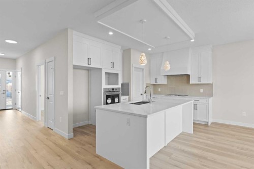 210 Monterey, High River, AB - Indoor Photo Showing Kitchen With Double Sink